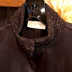 100 0/0 silk fitted long sleeve blouse. Great decorations on collar and sleeves.